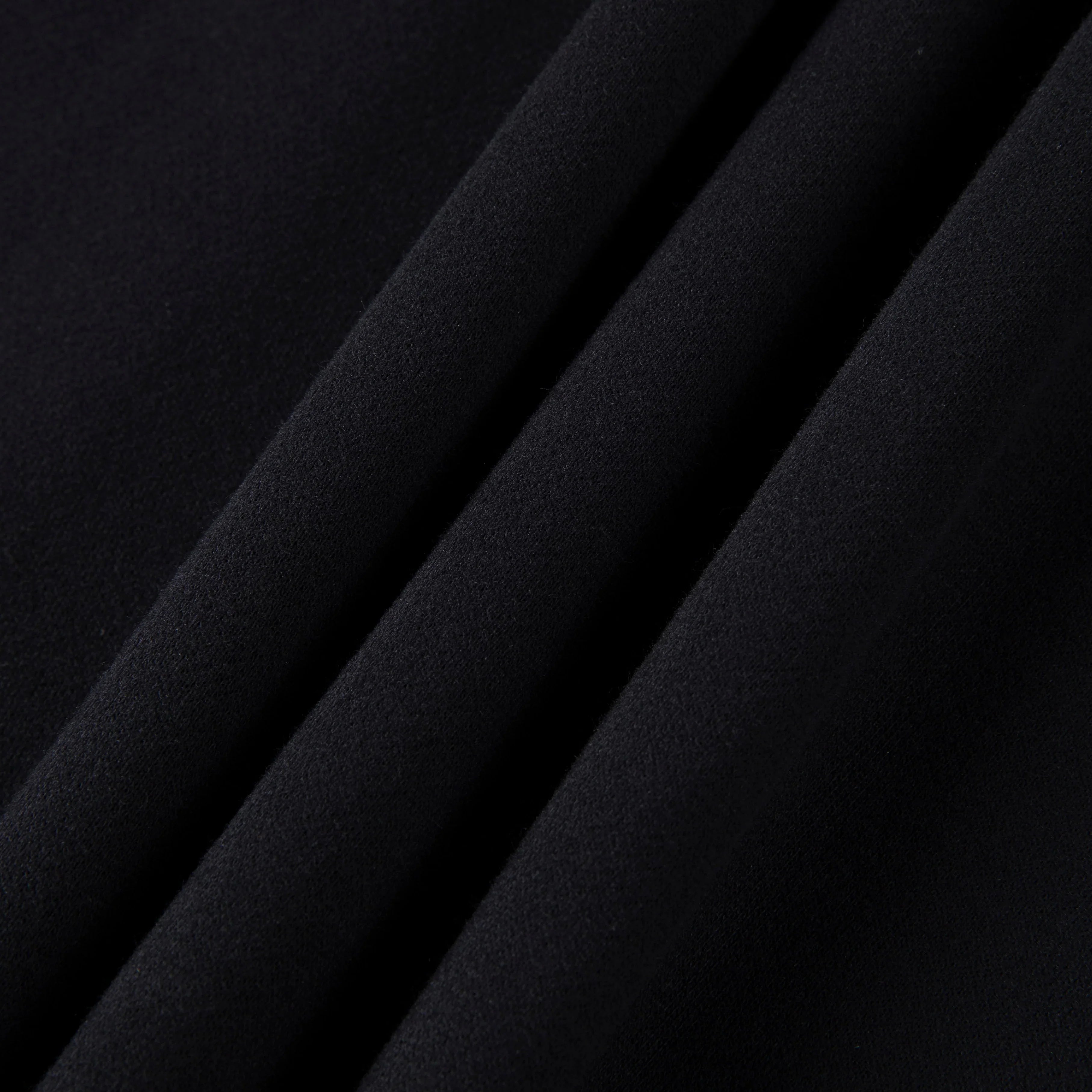 Black fabric texture with diagonal lines