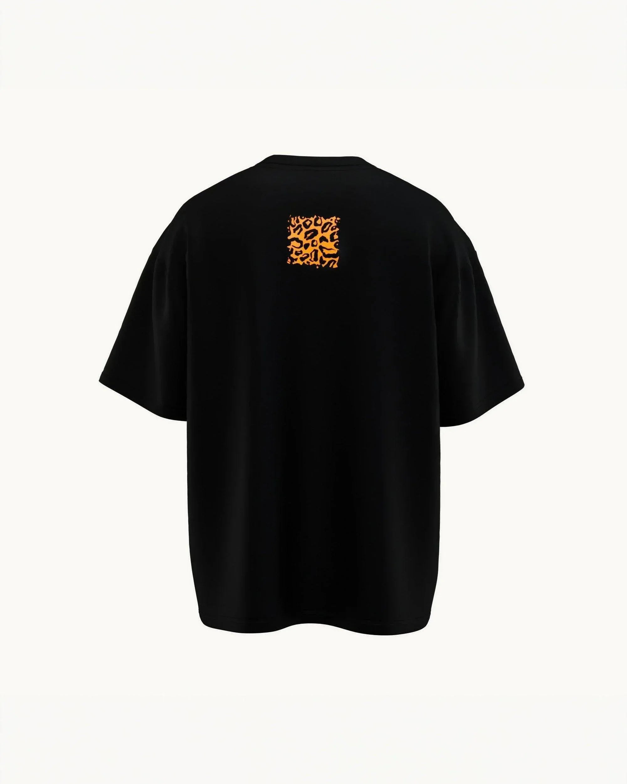 Black oversized t-shirt back with orange leopard print square graphic detail