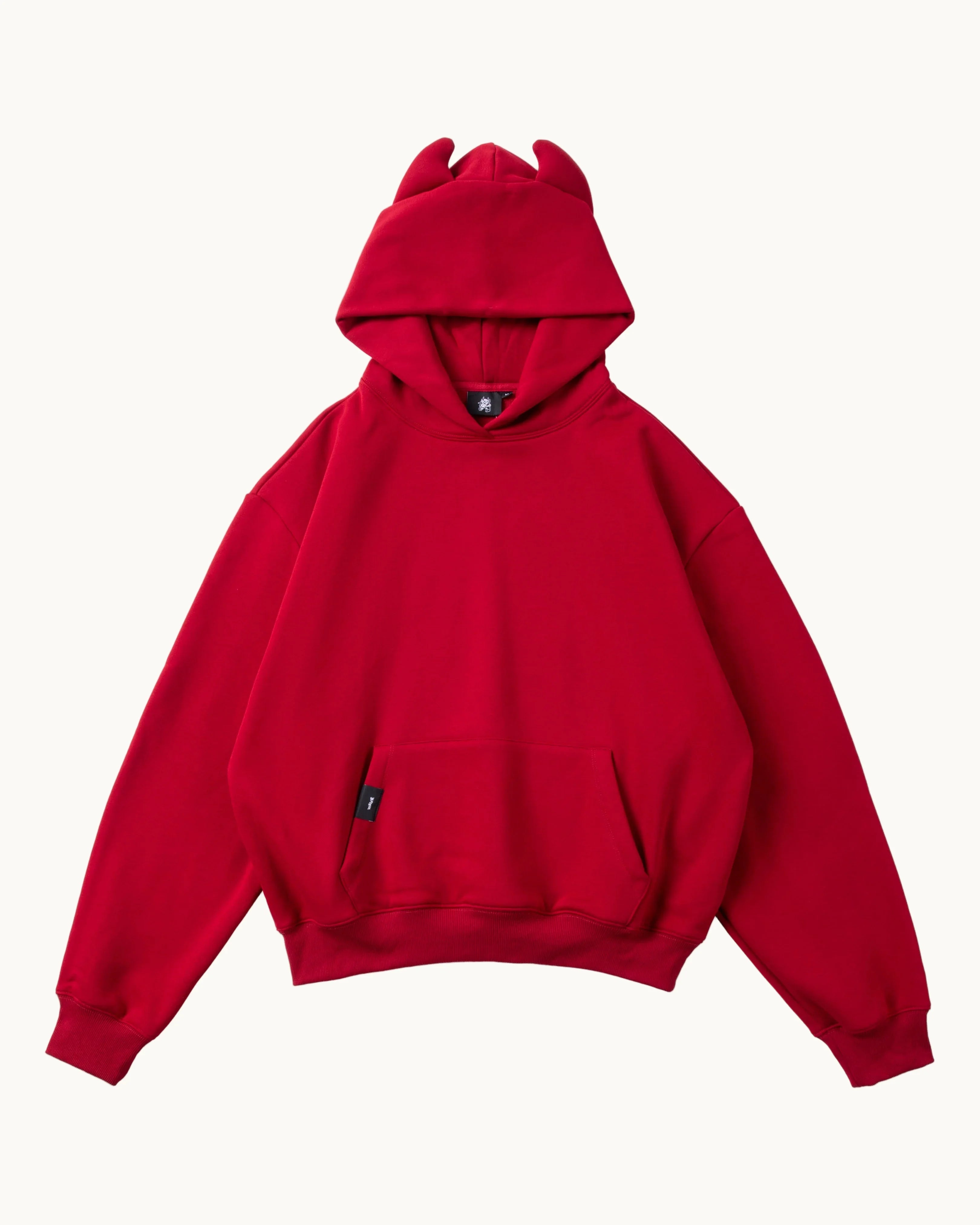 Red devil hoodie with pointed horns on hood, front pocket, isolated on white background